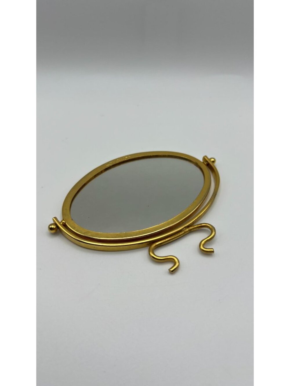 Oval Gold-Tone Vanity Mirror With Decorative Frame - Elegant Design For Tabletop